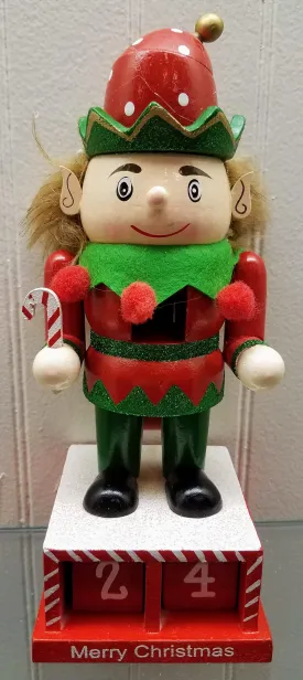 Elf nutcracker with candy cane & calendar 8"